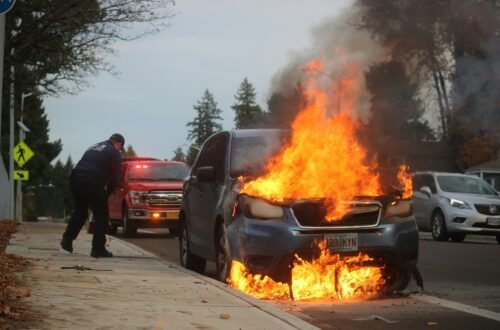 Overhead view of cars slowed on I-64 due to a traffic accident today, with emergency crews on site.