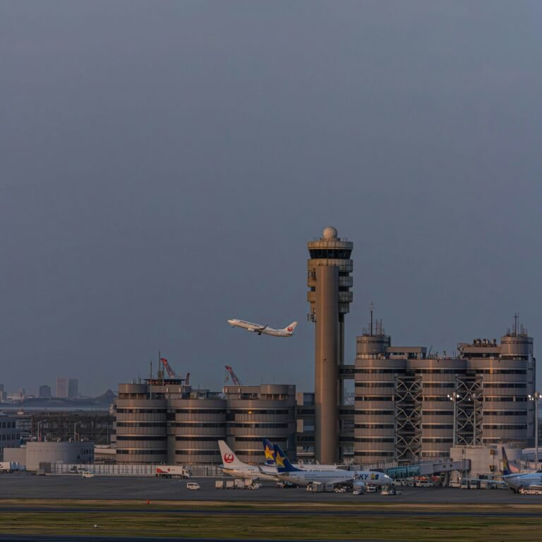 Air traffic controller monitoring flight paths, showing how much do air traffic controllers make a year with salary, shifts, and benefits.