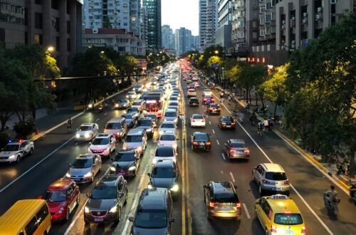 Traffic backed up on I-70 East with emergency vehicles ahead, showing why is traffic stopped on i-70 east today due to an accident.
