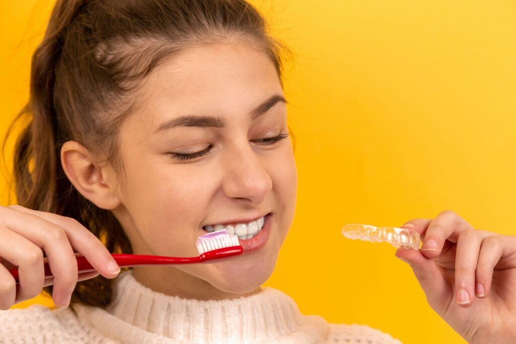 Close up of a person touching teeth showing how to stop sensitive teeth pain immediately