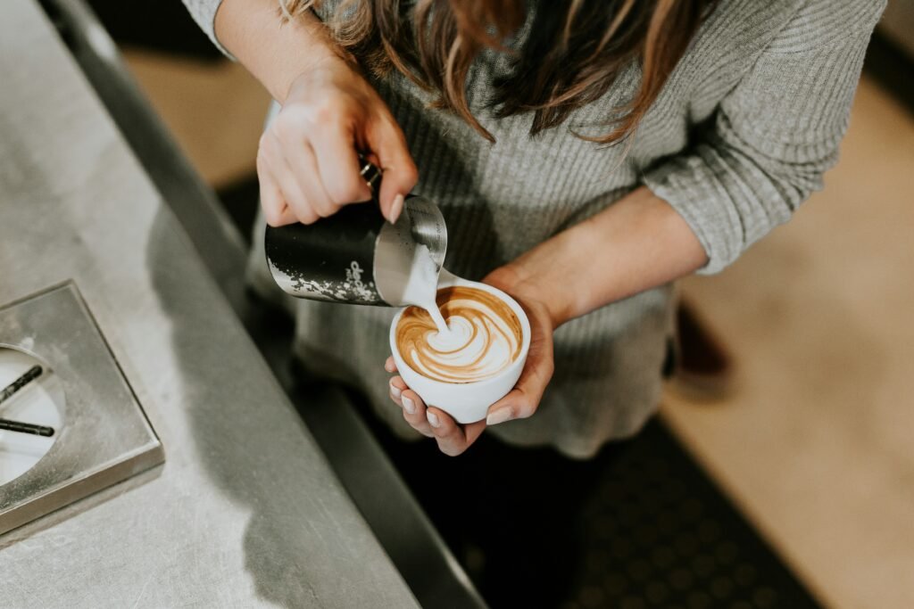 How to Make a Latte at Home covering espresso preparation, milk steaming, coffee beans, café-quality drinks, and latte techniques.