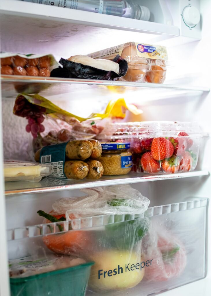 how to clean a refrigerator properly covering deep cleaning, food storage organization, odor control, bacteria removal, and appliance care.