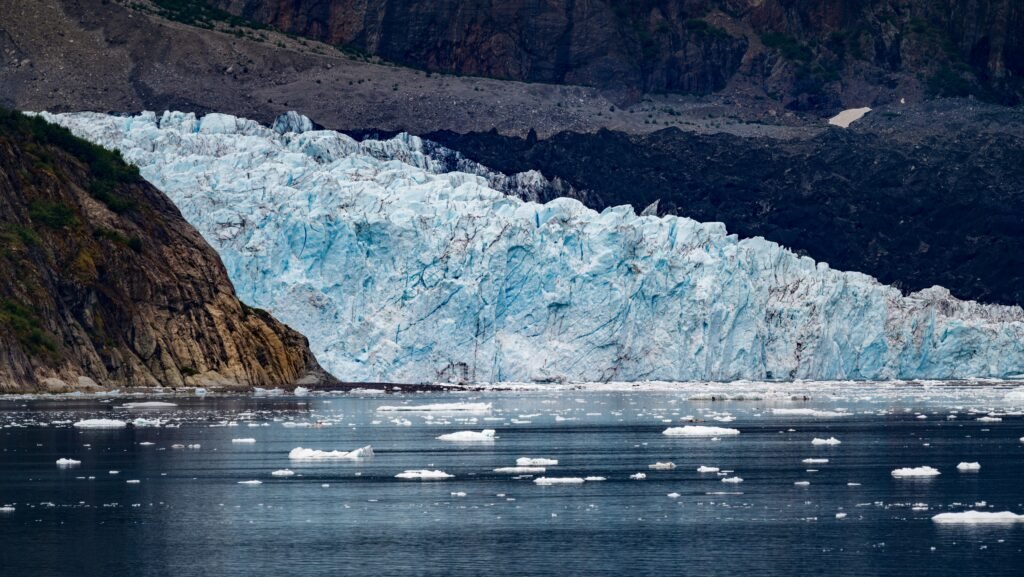 Visitors exploring Tracy Arm Fjord while following important safety guidelines around glaciers and wildlife.